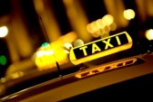 11292006-taxi-cab-at-night-with-the-sign-lit